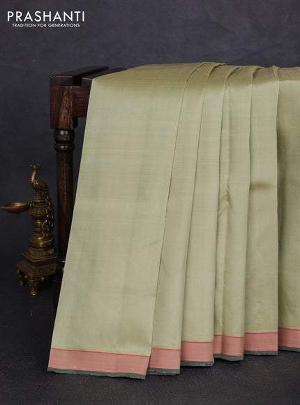 Pure kanchipuram silk saree pista green and red with plain body and thread woven border