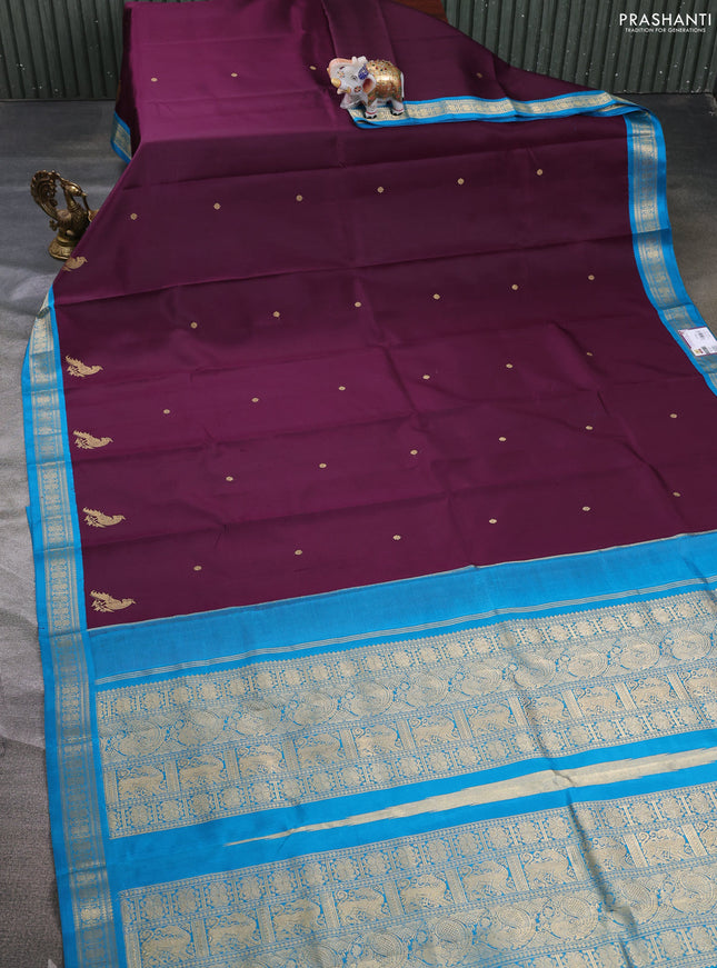 Pure kanchipuram silk saree deep wine and peacock blue with zari woven buttas and zari woven border
