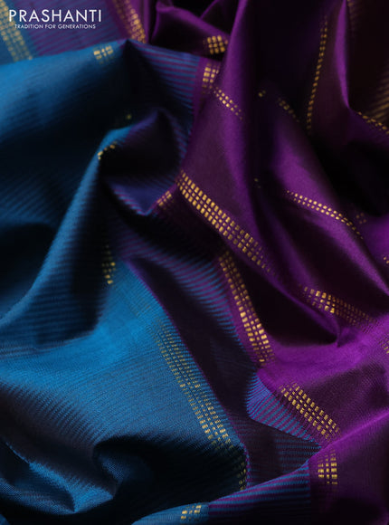 Pure kanchipuram silk saree peacock green and purple with plain body and zari woven border