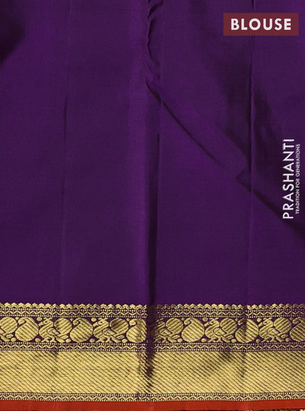 Pure kanchipuram silk saree peacock green and purple with plain body and zari woven border