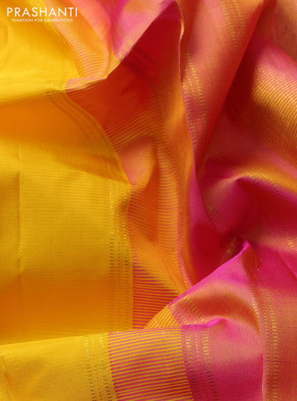 Pure kanchipuram silk saree yellow and pink shade with plain body and zari woven border