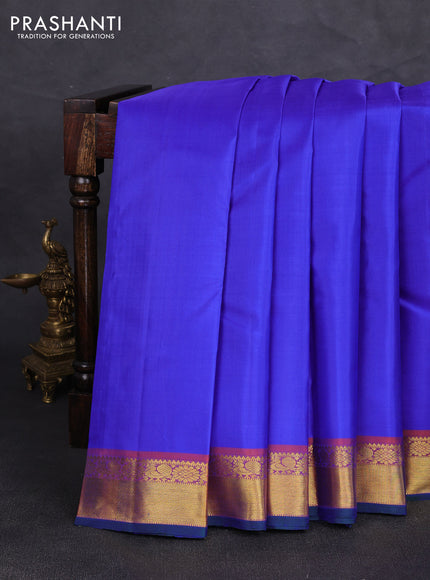 Pure kanchipuram silk saree royal blue and orange with plain body and zari woven border