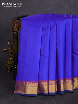 Pure kanchipuram silk saree royal blue and orange with plain body and zari woven border