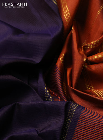Pure kanchipuram silk saree jamun shade and orange with plain body and zari woven border
