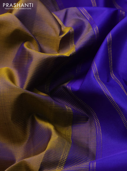 Pure kanchipuram silk saree dual shade of mustard and royal blue with plain body and zari woven border