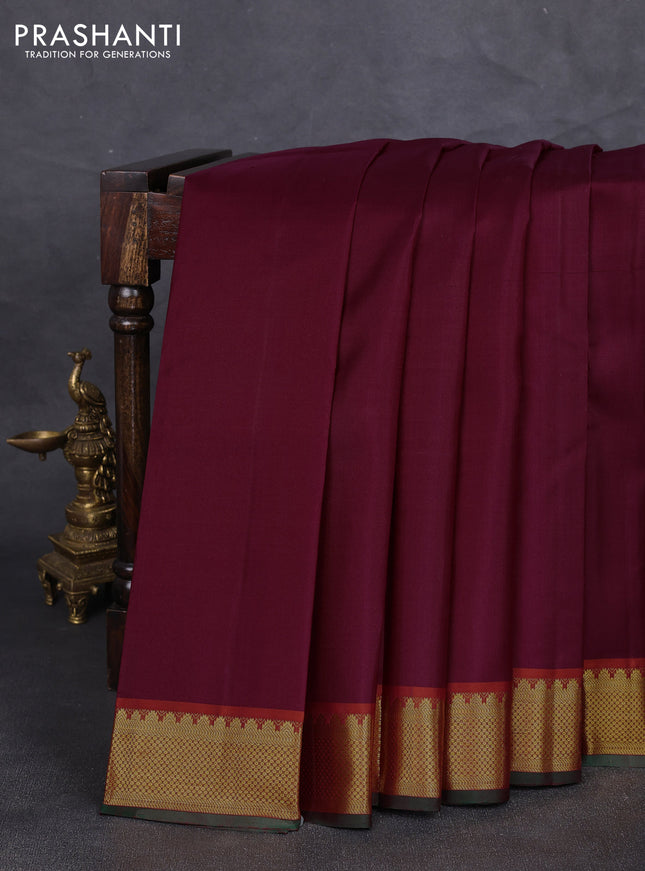 Pure kanchipuram silk saree wine shade and rust shade with plain body and temple zari woven border