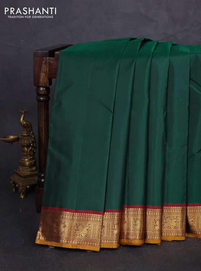 Pure kanchipuram silk saree green and maroon with plain body and zari woven border