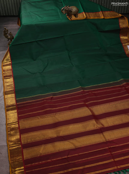 Pure kanchipuram silk saree green and maroon with plain body and zari woven border