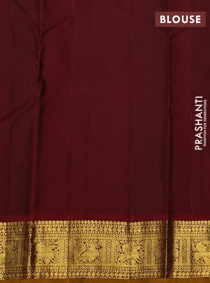 Pure kanchipuram silk saree green and maroon with plain body and zari woven border