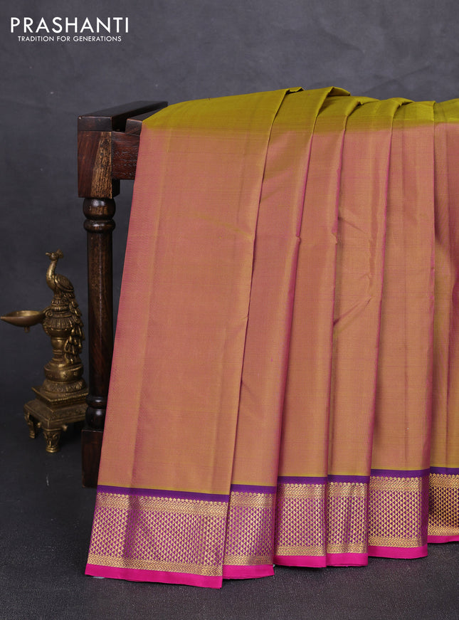 Pure kanchipuram silk saree dual shade of mustard and purple with plain body and zari woven border