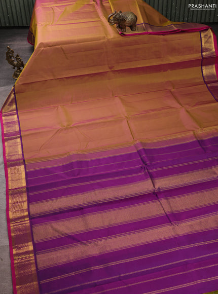 Pure kanchipuram silk saree dual shade of mustard and purple with plain body and zari woven border