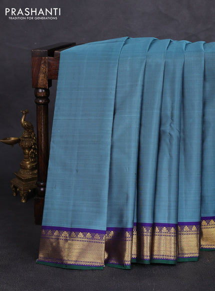 Pure kanchipuram silk saree bluish grey and blue with plain body and temple zari woven border