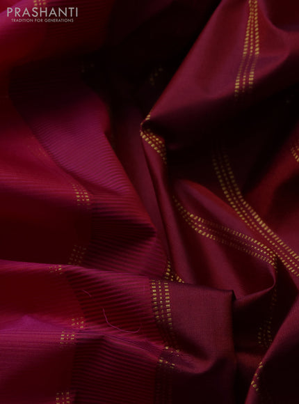 Pure kanchipuram silk saree pink and maroon with plain body and zari woven border