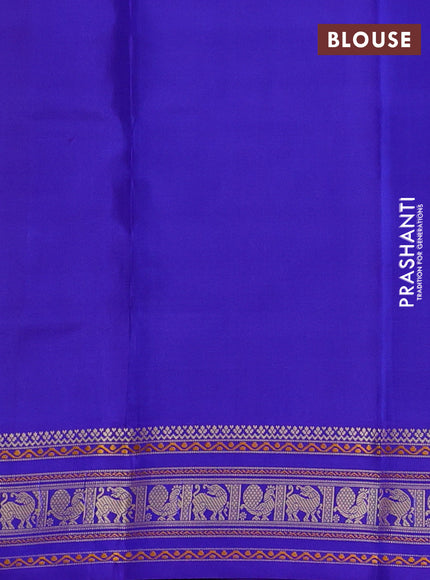 Pure kanchipuram silk saree dual shade of rust shade and royal blue with thread woven buttas and temple design thread woven border