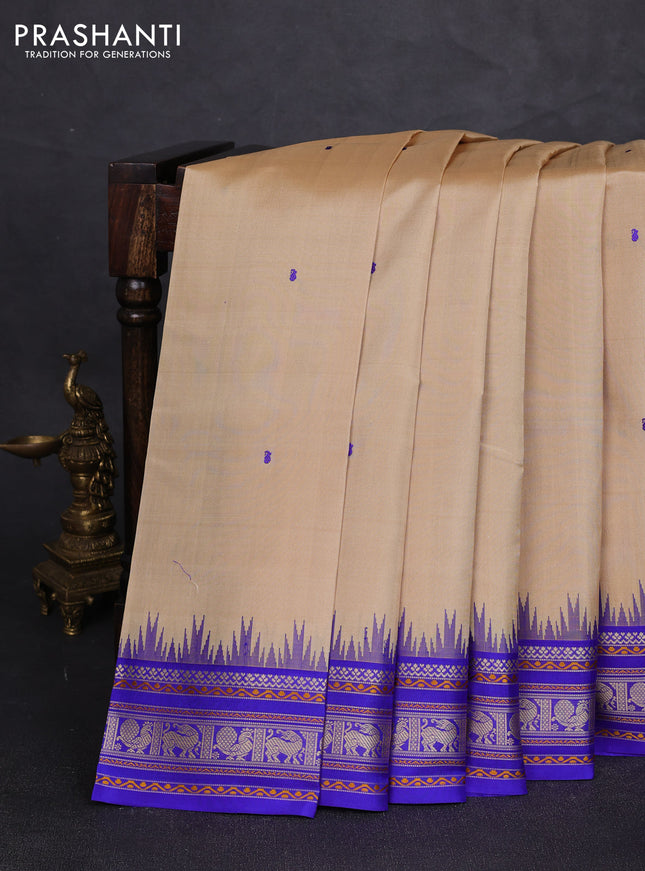 Pure kanchipuram silk saree beige and royal blue with thread woven buttas and temple design thread woven border