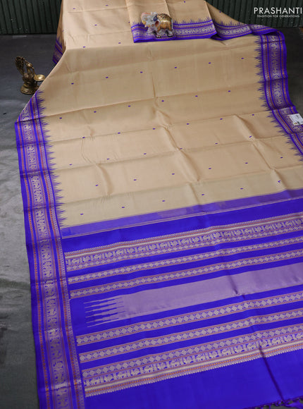 Pure kanchipuram silk saree beige and royal blue with thread woven buttas and temple design thread woven border