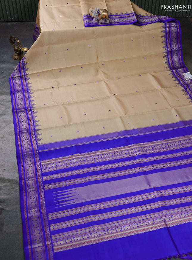 Pure kanchipuram silk saree beige and royal blue with thread woven buttas and temple design thread woven border