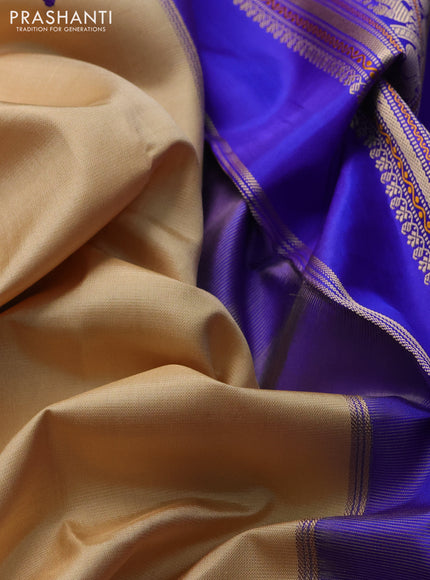Pure kanchipuram silk saree beige and royal blue with thread woven buttas and temple design thread woven border