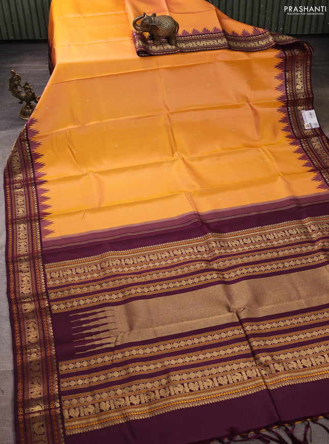 Pure kanchipuram silk saree peach orange and deep wine with zari woven buttas and temple design zari woven border