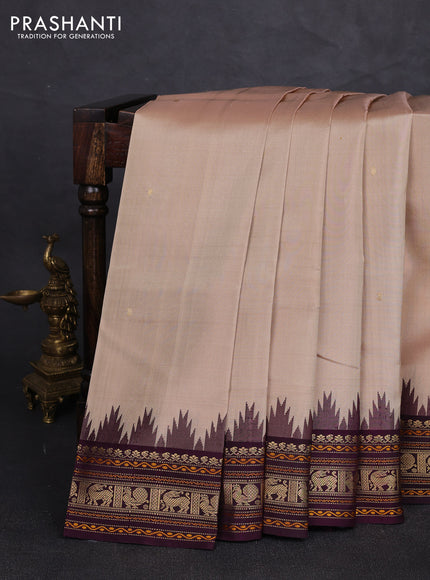 Pure kanchipuram silk saree beige and deep wine with zari woven buttas and temple design zari woven border