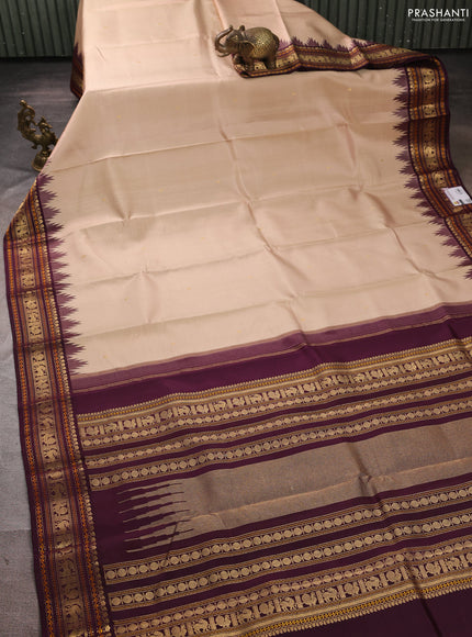 Pure kanchipuram silk saree beige and deep wine with zari woven buttas and temple design zari woven border