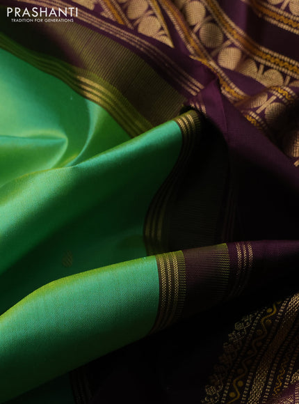 Pure kanchipuram silk saree teal green and wine shade with zari woven buttas and temple design zari woven border