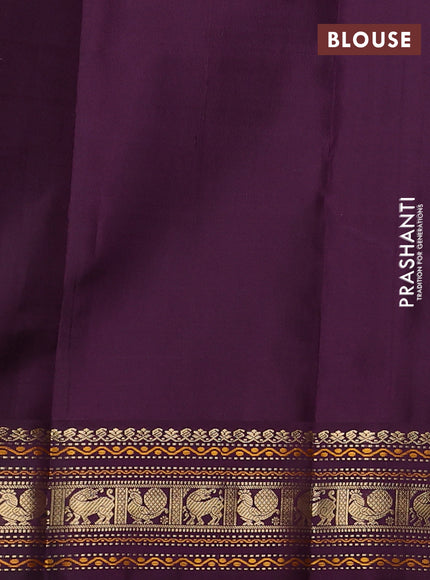 Pure kanchipuram silk saree teal green and wine shade with zari woven buttas and temple design zari woven border