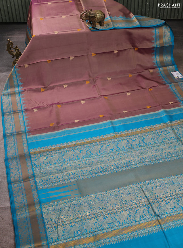 Pure kanchipuram silk saree dark beige and teal blue with thread woven buttas and temple design thread woven border