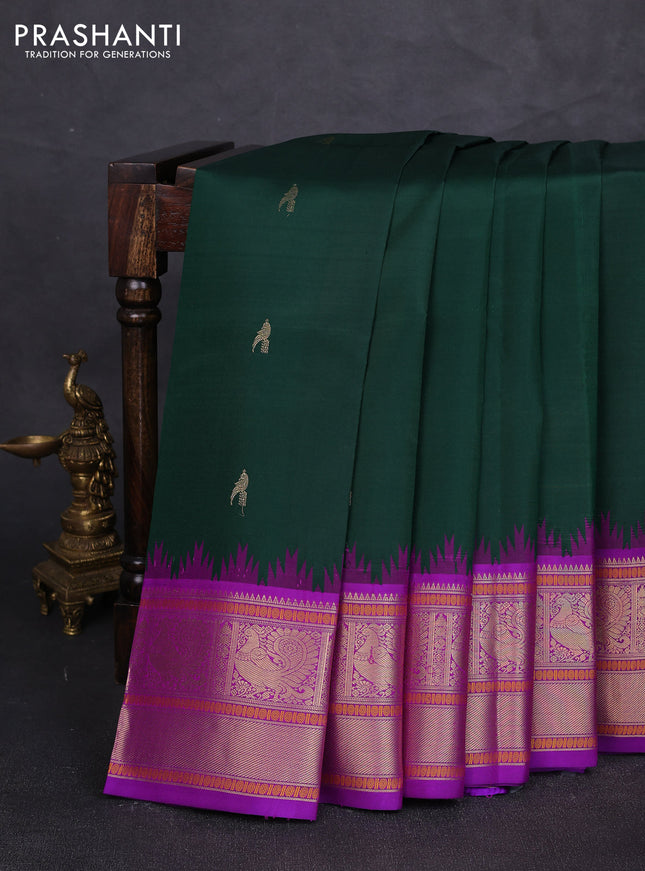 Pure kanchipuram silk saree bottle green and purple with zari woven buttas and temple design zari woven border