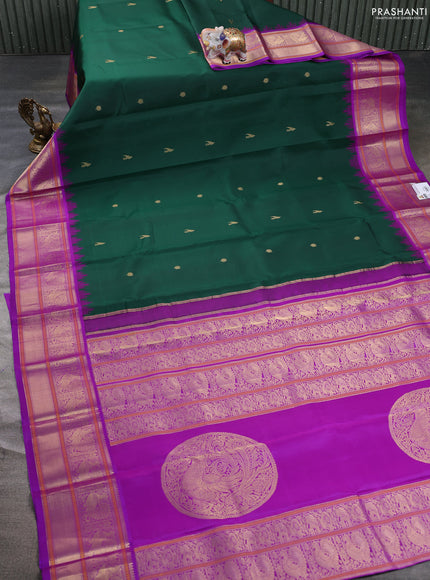 Pure kanchipuram silk saree bottle green and purple with zari woven buttas and temple design zari woven border
