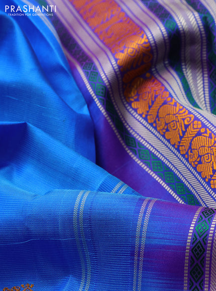 Pure kanchipuram silk saree blue and purple with thread woven buttas and long thread woven border