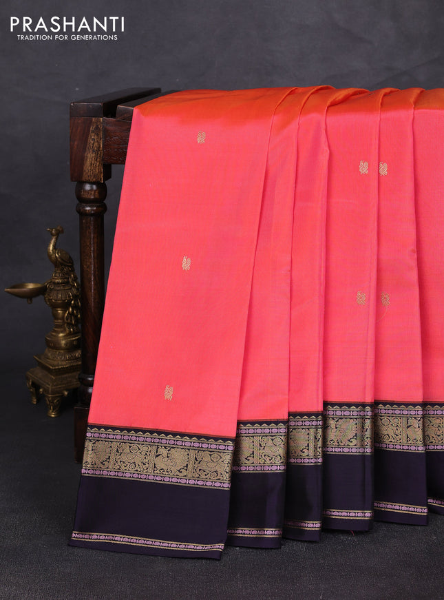 Pure kanchipuram silk saree dual shade of pinkish orange and deep violet with annam zari woven buttas and rettapet zari woven border
