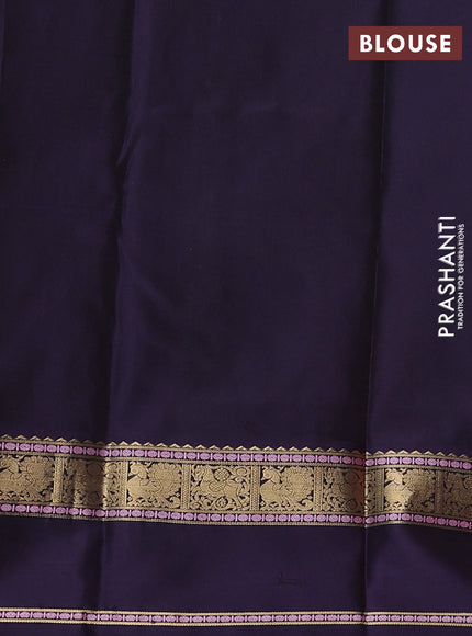 Pure kanchipuram silk saree dual shade of pinkish orange and deep violet with annam zari woven buttas and rettapet zari woven border