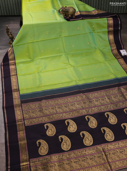 Pure kanchipuram silk saree dual shade of loght green and deep violet with annam zari woven buttas and rettapet zari woven border