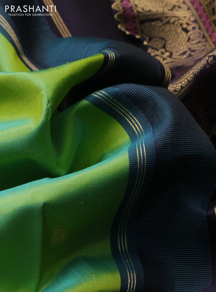 Pure kanchipuram silk saree dual shade of loght green and deep violet with annam zari woven buttas and rettapet zari woven border