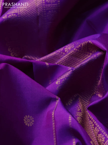 Pure kanchipuram silk saree purple and dual shade of pinkish orange with zari woven buttas and rettapet zari woven border