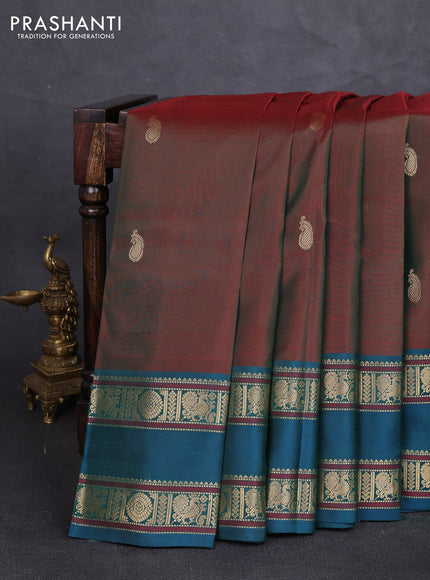 Pure kanchipuram silk saree dual shade of maroon and peacock green with paisley zari woven buttas and rettapet zari woven border