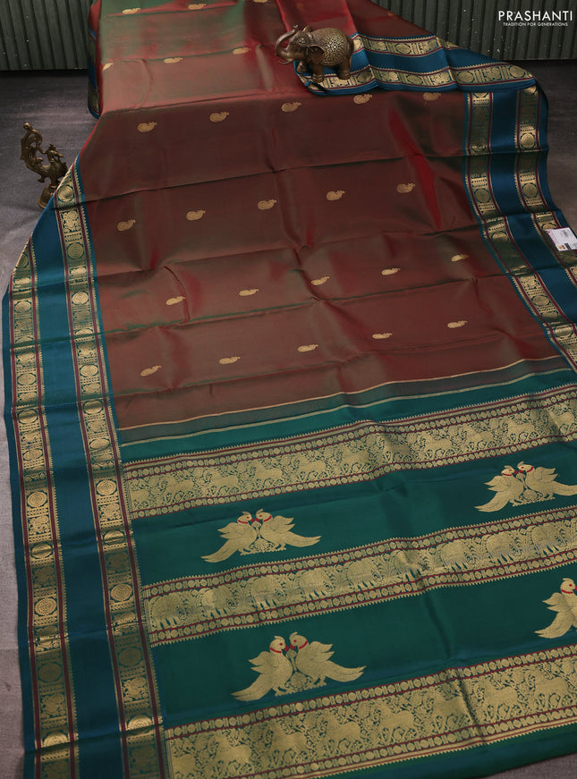 Pure kanchipuram silk saree dual shade of maroon and peacock green with paisley zari woven buttas and rettapet zari woven border