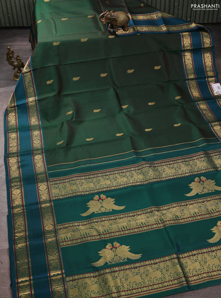 Pure kanchipuram silk saree bottle green and peacock green with paisley zari woven buttas and rettapet zari woven border