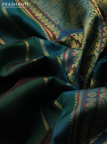 Pure kanchipuram silk saree bottle green and peacock green with paisley zari woven buttas and rettapet zari woven border