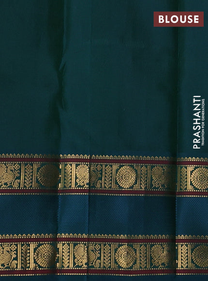 Pure kanchipuram silk saree bottle green and peacock green with paisley zari woven buttas and rettapet zari woven border