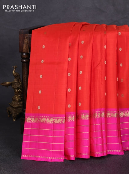 Pure kanchipuram silk saree orange and pink with allover zari woven buttas and long zari woven border