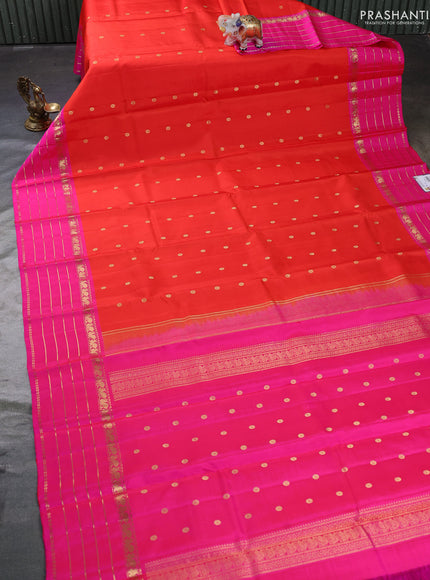 Pure kanchipuram silk saree orange and pink with allover zari woven buttas and long zari woven border