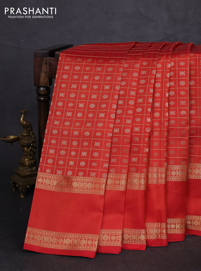 Pure kanchipuram silk saree rust shade with allover zari checks & buttas and rettapet long zari woven butta border