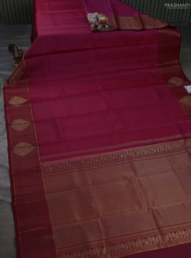 Pure kanchipuram silk saree pink and maroon with allover stripe pattern and long zari woven border