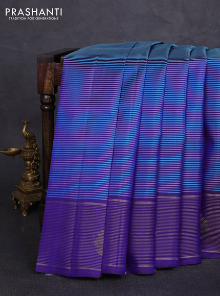 Pure kanchipuram silk saree teal blue and royal blue with allover stripe pattern and long zari woven border