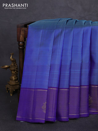 Pure kanchipuram silk saree teal blue and royal blue with allover stripe pattern and long zari woven border