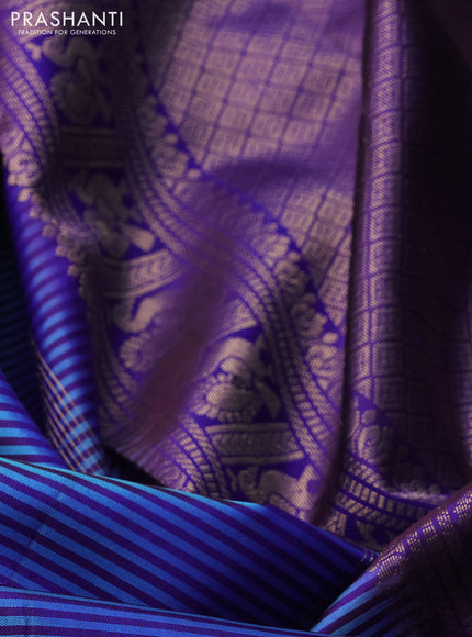 Pure kanchipuram silk saree teal blue and royal blue with allover stripe pattern and long zari woven border
