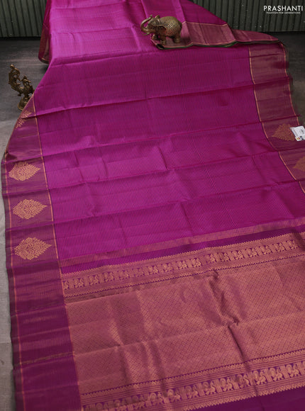 Pure kanchipuram silk saree pink and dual shade of green with allover stripe pattern and long zari woven border