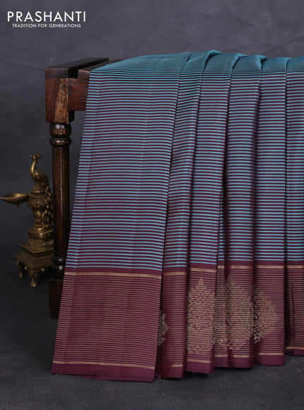 Pure kanchipuram silk saree teal blue and coffee brown with allover stripe pattern and zari woven border